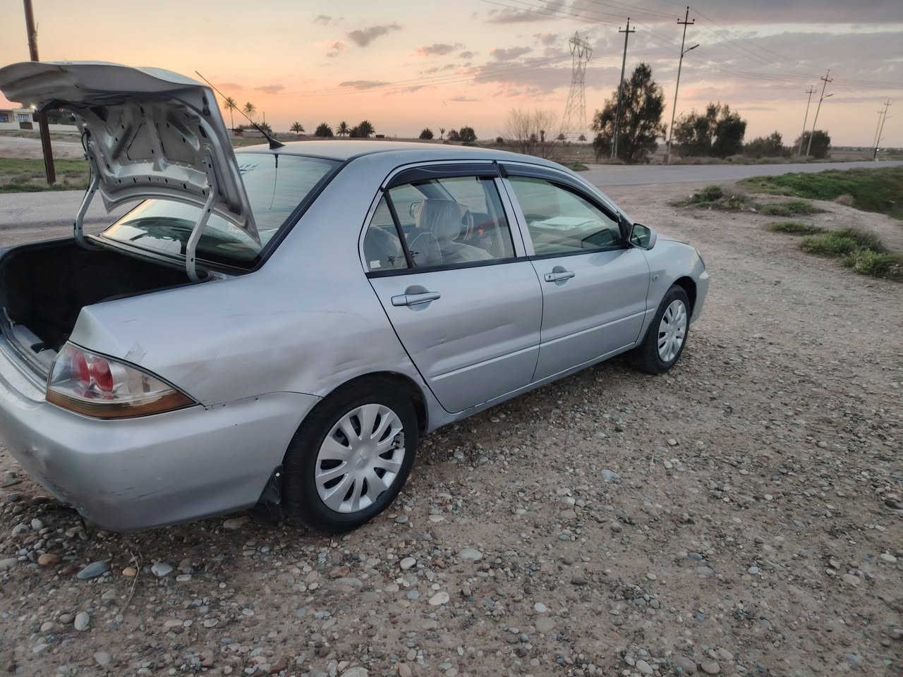 سلام عليكم لانسر 2011 للبيع رقم بغداد سنوية ما نافذة السيارة جديدة مال جناي السيارة بدون حادث بدون صبغ السونار مرفق مع الصور مكينة كير مكفولات صدر أمامي خلفي جديد تدفىة تبريد شغال تخم تاير داخل عسلي السيارة السيارة احلة من الصور كبل لشارع السعر (78) وبيها مجال مكان السيارة ديالى الشراي يتصل ***********
