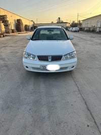 نيسان سني ياباني موديل 2009سياره مكينه قبق ابيضّ مكينه وكير مكفوله صدر...