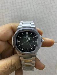 ساعة • Paazomu