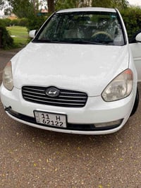 :- اكسنت خليجي شركه العامة موديل ٢٠١١  وهذا التقرير مالتها مرفق بالصور...