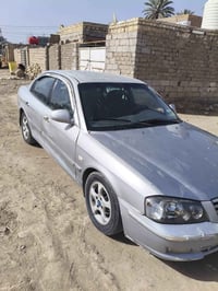 كيا اوبتما • ٢٠٠٢ • ست سلندر