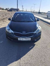 كيا فورتي 2015 رقم بغداد  وارد أمريكي حادثها بنيد فقط بدون  دواخل محرك...