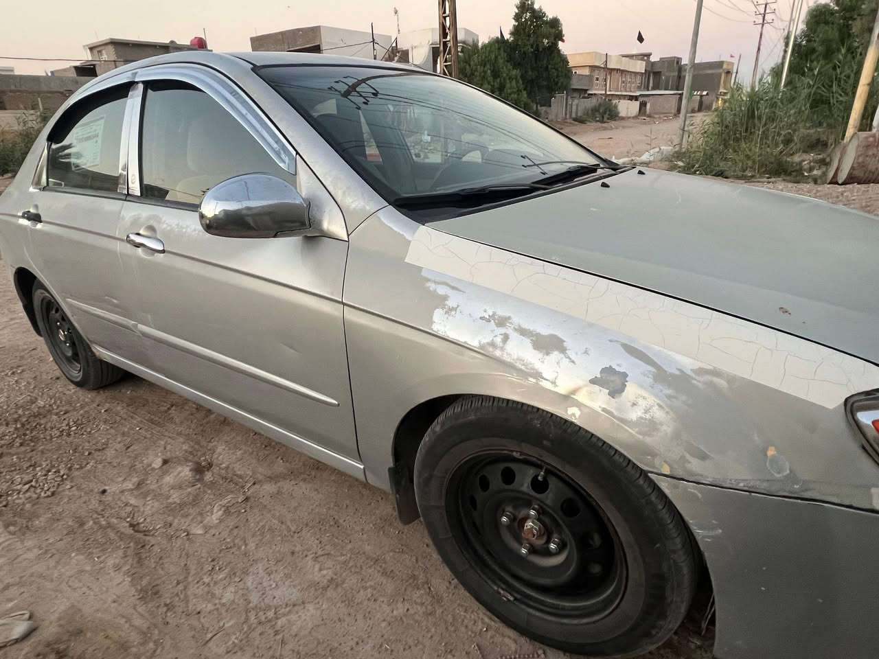 السلام عليك سبكترا موديل ٢٠٠٦ وارد أمريكي بدون دواخل محرك ٢٠٠٠ كير ومكينه جديد  تبريد ثلج السيارة ماناقصة شي  تحويل ثاني السعر 75وبيها مجال   للإستفسار على ***********
