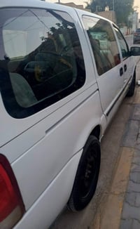 سياره شوفرليت ابلاندر رقم بغداد بسمي انكليزي موديل ٧ لون ابيض بيع او م...