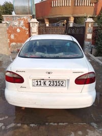 دايو لانوس رقم نكليزي  بغداد  جديد سنوية 2030 بسمي محرك وكير مكفول   ت...