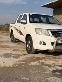 بيكم هايلوكس 2014  رقم بغداد  اوتماتيك  شاصي 19سعودي  السعر 200 وبيه م...