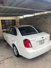 اوبترا للبيع٢٠١٢ الون ابيض استلام الشركة السيارة خير من الله صدر امامي...