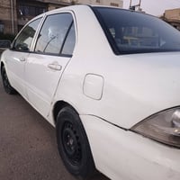 لانسر • ٢٠١٠ • صبغ