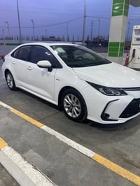 كورلا هايبرد للبيع موديل 2025 ماشيه 10 مكفوله رقم بغداد تحويل مباشر سع...