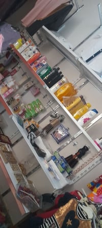 رفوف محل • ٤ طوابق • ابيض