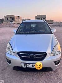 كيا كارنز • ٢٠٠٩ • رقم نجف