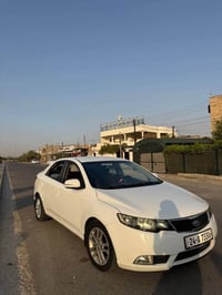 سيراتو ٢٠١١ • ابيض • معجون