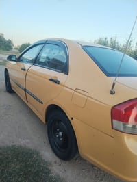 سبكترا 2008سياره كير مكينه حلوات يعني جدد سياره حلوه ومرتبه رايدله ترت...