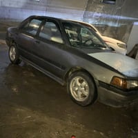 مازدا 323 • موديل ١٩٩١ • اربيل