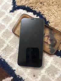 ايفون اكس • شغال • شرطة الخامسة