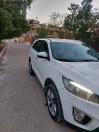 سورنتو ابيض موديل 2016 رقم بغداد بأسمي سبعة راكب ماشية 105بصمة تشغيل ل...