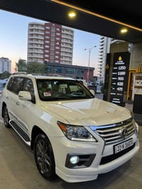 سياره لكزس Lx700 بريمي اصل موديل 2013 ماشيه143الف قابل لزياده كفاله عا...