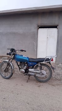 ماطور ٥ كير • دراجة نارية