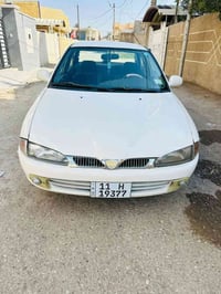 بروتون 2004 رقم بغداد انكليزي بسمي سنويه وهزه جديده محرك لاينقص ولا يب...