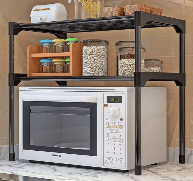 الاستخدامات

تنظيم أدوات المطبخ مثل الأطباق، الأكواب، علب البهارات، وصناديق الطعام

مثالي لوضع الميكرويف أو الفرن الكهربائي بالأسفل وتخزين المستلزمات فوقه

مناسب لاستخدامه كرف إضافي في المطبخ، غرفة الطعام أو حتى المكتب

يساعد في استغلال المساحات الضيقة بشكل عملي ومرتب

المميزات

تصميم بسيط وعملي يناسب جميع المطابخ والديكورات

مقاسات مثالية: العرض 57.5 سم × العمق 26 سم × الارتفاع 50 سم

رفّان متينان يتحملان وزنًا كبيرًا بفضل الخامة السميكة

ثبات عالي بدون اهتزاز حتى عند وضع أجهزة كهربائية مثل الميكرويف

زوايا مدوّرة للحماية من الخدوش أو الإصابات أثناء الاستخدام

سهولة التركيب بدون أدوات معقدة

استخدام متعدد الأغراض في المطبخ، غرفة التخزين، المكتب أو الحمام (سعر25الف رقم ***********)
