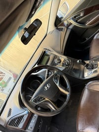 هونداي ازيرا ٢٠١٥ خليجي  ابيض صدفي فول مواصفات ١/١  رقم بغداد بسمي محر...