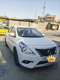 نيسان صني موديل 25 رقم بغداد بااسمي كفاله ماعده رصعه بجاملغ الأيمن ورص...