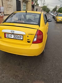 اكسنت موديل 2009رقم بغداد دولي مكاتبه مع شرعي ضرر داير فوق تاير وره بد...