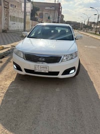 اوبتيما 2010 فول ماعدى البصمه رقم بغداد بسمي شرط تحويل ثاني يوم  سياره...