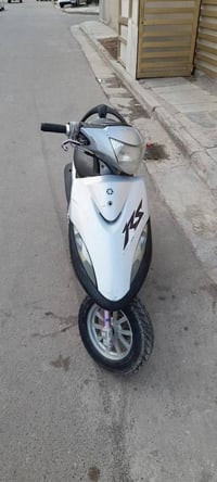 دراجة سكوتر نظيفة موجودة في بغداد -حي العامل 07812639202