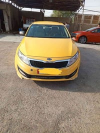 كيا ابتيما موديل 2012 طخات بسيطه  السعر 90 رقم بغداد انكليزي مكاني بغد...