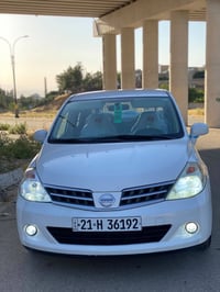 تيدا • ٢٠٠٩ • اوتوماتيك