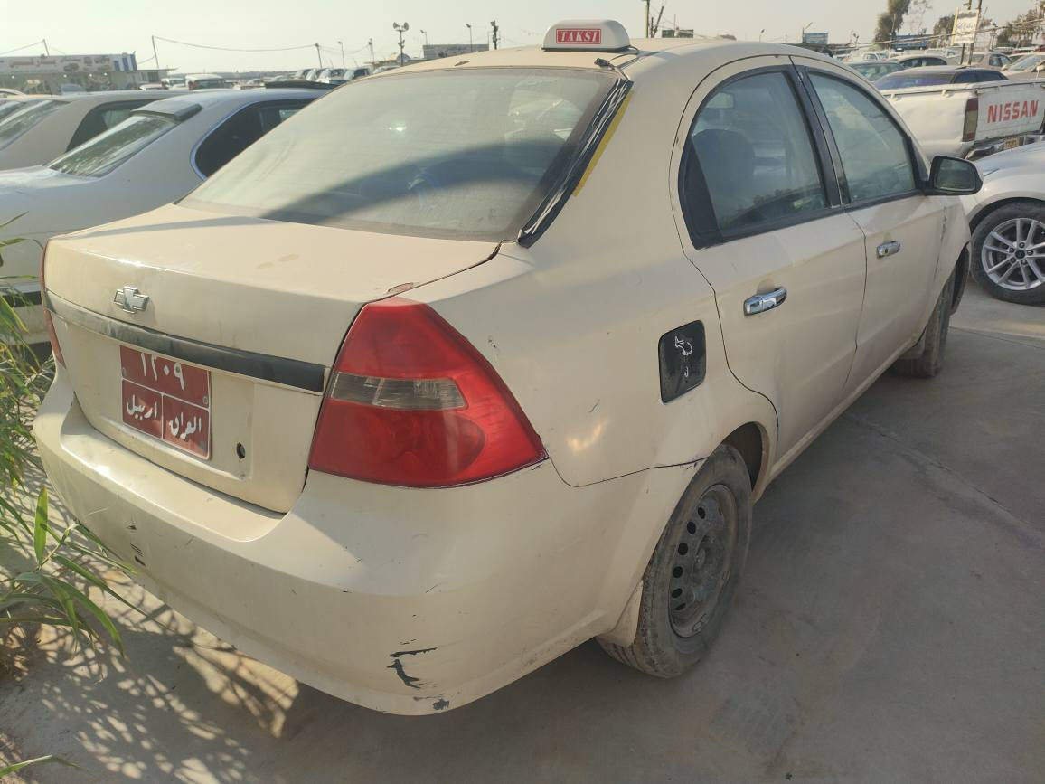 افيؤ تكسى موديل ٢٠٠٧ گيرعادى 
رةقى جوانة ١٢٠٩ جوار رةقةمى 
سعرى ٦٧ وةرقة 
٢ مليؤن غرامةى لةسةرة 
بةناوكردن بةشةرتة ***********
سيارةكة مةسرةفى تيداية 
شوين هةولير أربيل, العراق
