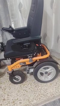 عربة معوقين • كهربائية • نجف شارع المطار