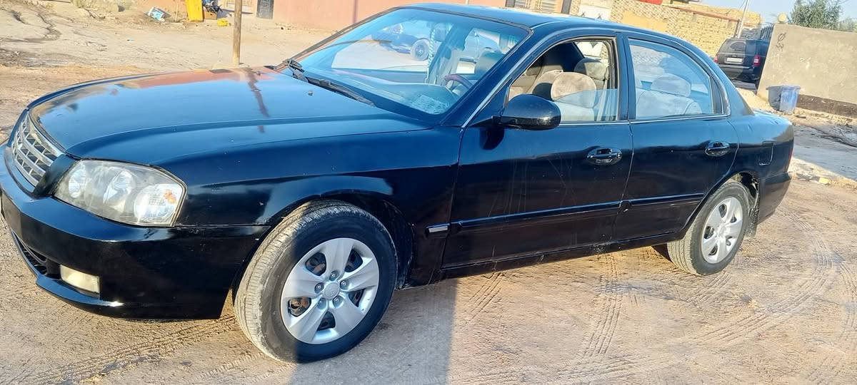 السلام عليكم
اوبتما 2001 للبيع 
رقم قادسية مشروع وطني مكينة وحدادية جاهزة السيارة مصبوغة عام المالك سكنة ديوانية و مكان هم السيارة  ديوانية سعرها 50 ورقة وبيها مجال 
***********
