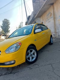 اكسنت • ٢٠١٠ • مكينه ١٤٠٠