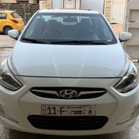 اكسنت موديل 2016 لون ابيض خليجي  رقم بغداد  انكليزي فتحة سقف ويل ١٧ لا...
