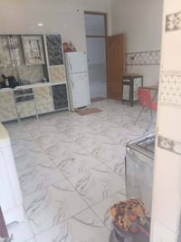 بيت مصفر مساحته 200 كوت حي الجامعه الاستفسار ع رقم 07723510732