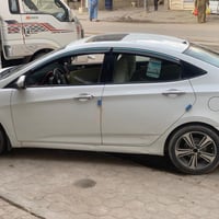 اكسنت ٢٠١٤ • ابيض • ١٦٠٠