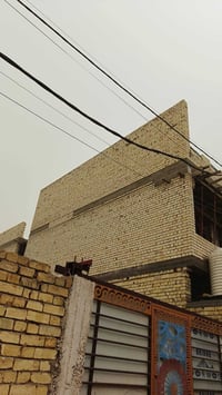 خلف بناية • قطعة أرض • بغداد