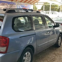 كيا سيدونا موديل 2007 رقم بغداد  سياره جديده  محرك 3800 بانزين  غاز من...