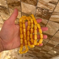 مكلف بالنشرمسباح كهرب خامة سيراميك بعسل كبسولي الوزن 60 غرام / عدد الح...