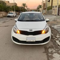 كيا ريو 2014 وراد خليجي محرك 1600 لون الداخل بيجي  بي صبغ الجاملق الام...