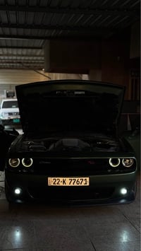 للبيع دوج جالنجر 2021 لون زيتوني ماشيه 28 ونص  مكينه 5700  عليه شوته م...