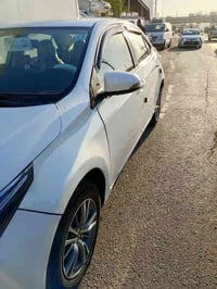 كورله خليجي 2015 ماشيه 107 الف لون أبيض بغداد الدولي بيه بنيد صبغ وبيه...