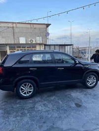 1-سورنتوا موديل 2014  امريكي  2-ضررها جاملغ امامي جهة سايق   3-رقم بغد...