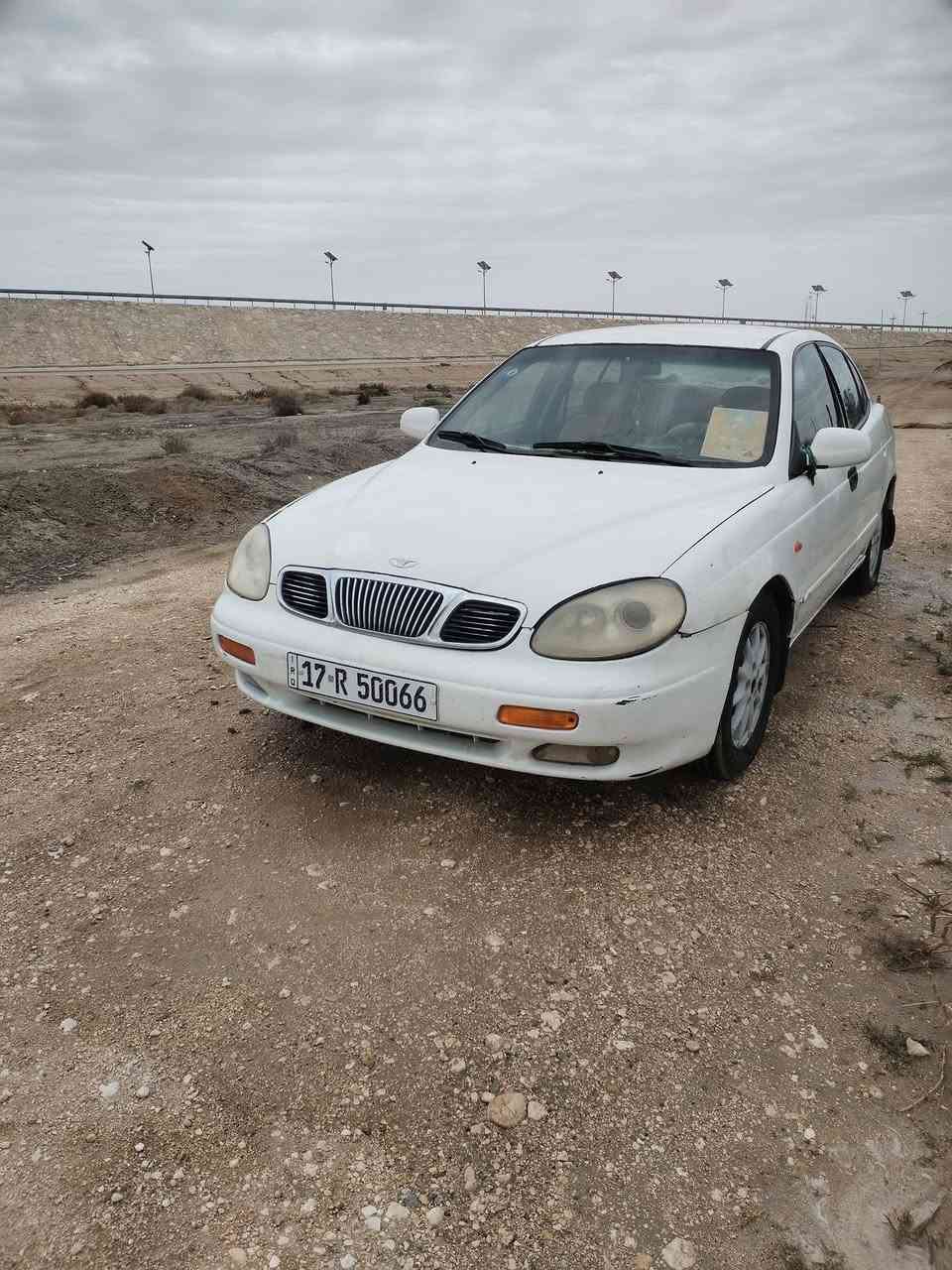 دايو لكنز موديل 2000 سياره خير من الله مكينه وكير جدد سياره باسمي رقم مثنى سنويه لحد 2030 مكاني ذي قار تليفون ***********
