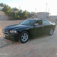جارجر م 2013السعر135$رقم صاحب السياره07773587532