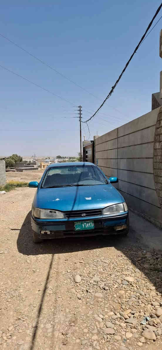 هيونداي النترا موديل 1992 محرك كير شرط  لا صرف ولا نفخ كاملة كاملة السيارة وين ما تريد تمشيك ضرر ما بيها بس دوائر بيها ضربة بسيطة بالجاملغ الخلفي بسيطة مثل ما موضح بالصورة 
 كوبون بيها جديد مو القديم جامات كهرب شغالة كلها طخم تايرات جديد غير الي بالتصوير وباتري هم جديد
ملاحظة صبغ السيارة كله بلادي عدا الجاملغات والبوند باقي الصبغ كلو بلادي
السيارة بالتصوير تبين ما مرتبة لان ما نظيفة إذا تنغسل تصير احلى من الصور
***********
