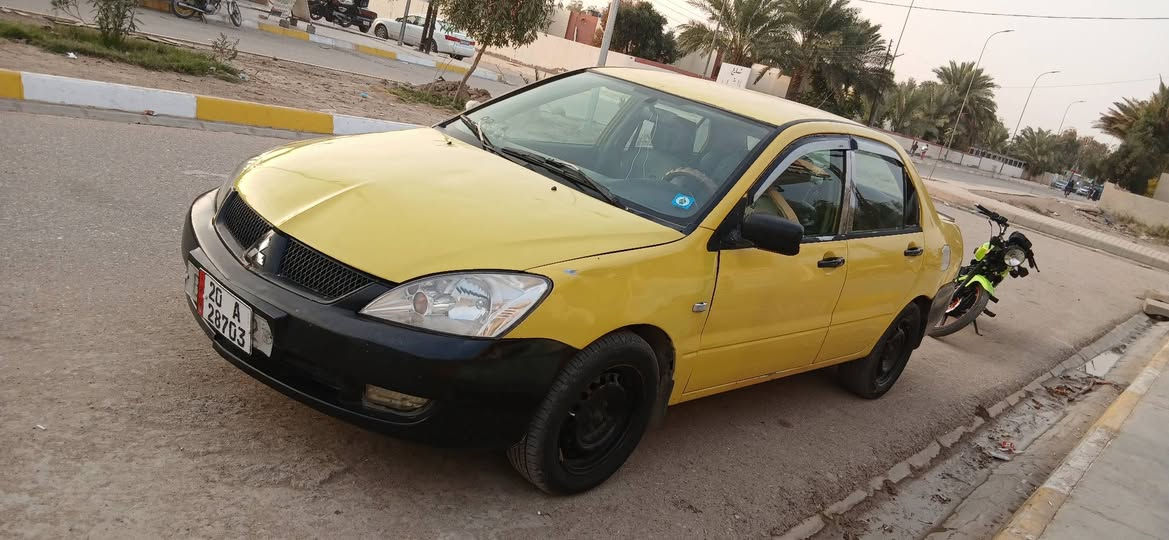 لانسر رقم ديالى ٢٠١٠ بيه طخه الخشم البنيد وبيه بلبك لايت طخه بدون ضرر سعرر ٦٣ وبيه مجال مكان ديالى الويجهيه 
***********
