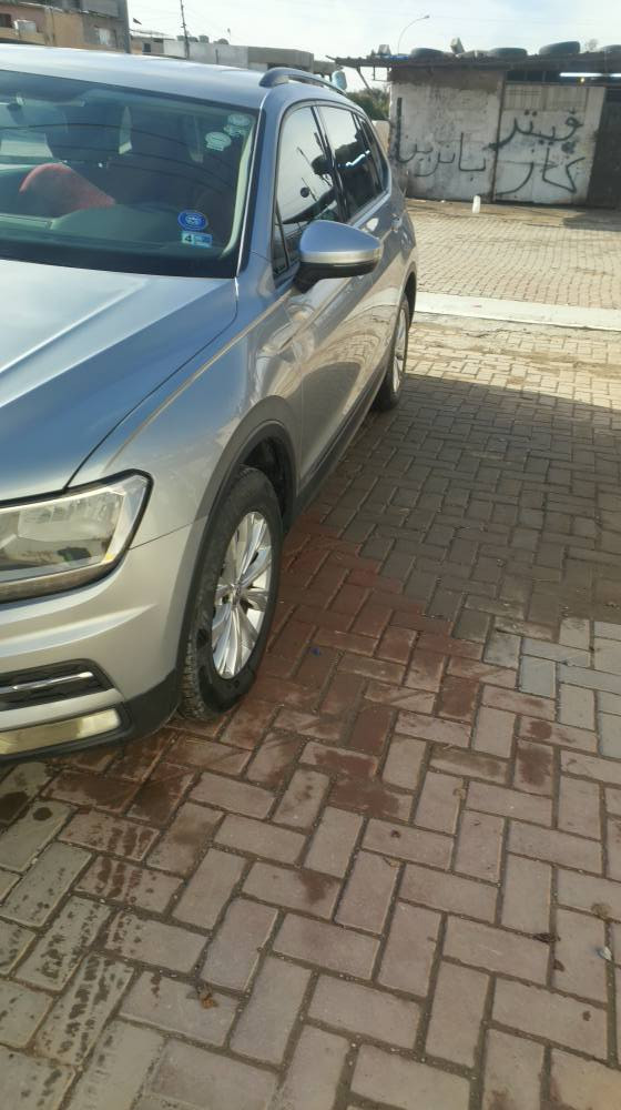 فوكس واكن تيكوان 7راكب رقم اربيل دولي سنويه وهزه وبراد جديد بسمي ضرراقل الربع صبغ جامرلغ السكن مع شي قليل في البنيد بدون تبديل اي قطعه السياره على وضع الشركه ***********بيه واتساب كركوك, العراق
